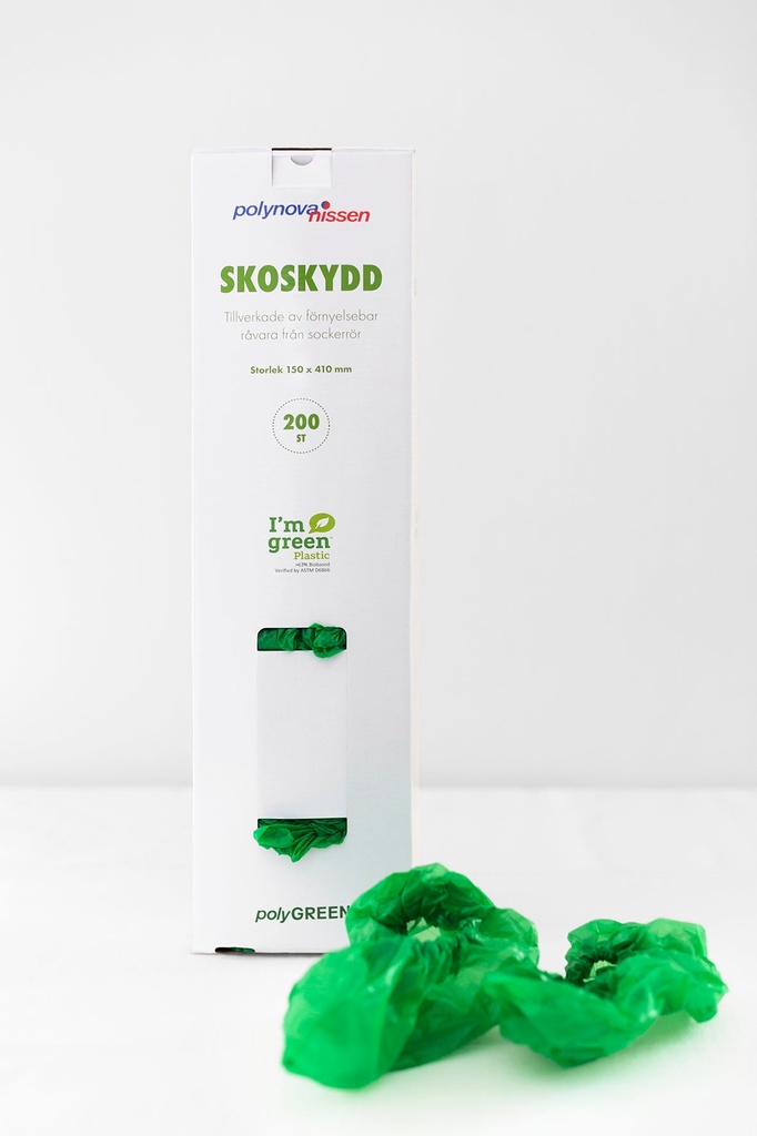 Hållare för skoskyddskartong